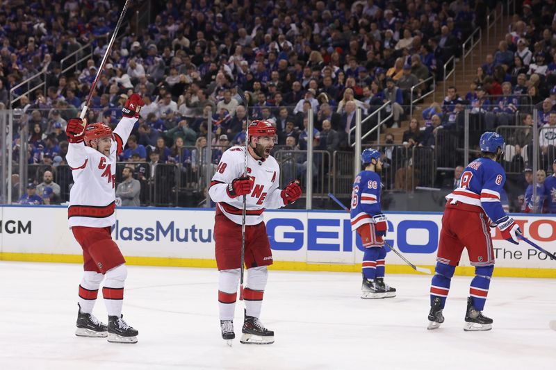 May 13, 2024; New York, New York, USA; Carolina Hurricanes left wing Jordan Martinook (48) celebrates his goal against the New York Rangers during the third period of game five of the second round of the 2024 Stanley Cup Playoffs at Madison Square Garden. Mandatory Credit: Brad Penner-USA TODAY Sports