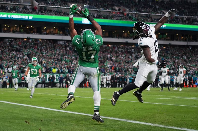 Philadelphia Eagles linebacker Nakobe Dean (17) intercepts a pass intended for Jacksonville Jaguars running back D'Ernest Johnson (2) during the second half of an NFL football game Sunday, Nov. 3, 2024, in Philadelphia. (AP Photo/Matt Slocum)