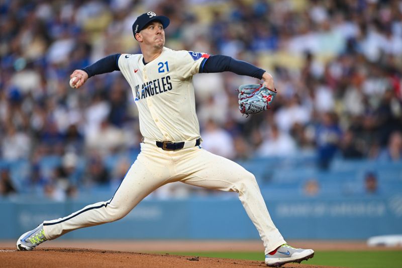 Sep 21, 2024; Los Angeles, California, USA; Los Angeles Dodgers pitcher Walker Buehler (21) throws a pitch against the Colorado Rockies during the first inning at Dodger Stadium. Mandatory Credit: Jonathan Hui-Imagn Images