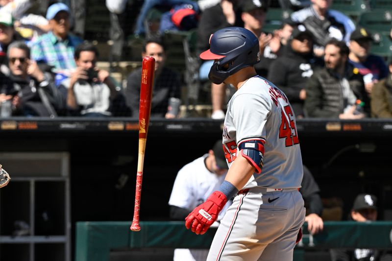 May 15, 2024; Chicago, Illinois, USA;  Washington Nationals first baseman Joey Meneses (45) flips his bat after striking out during the eighth inning at Guaranteed Rate Field. Mandatory Credit: Matt Marton-USA TODAY Sports