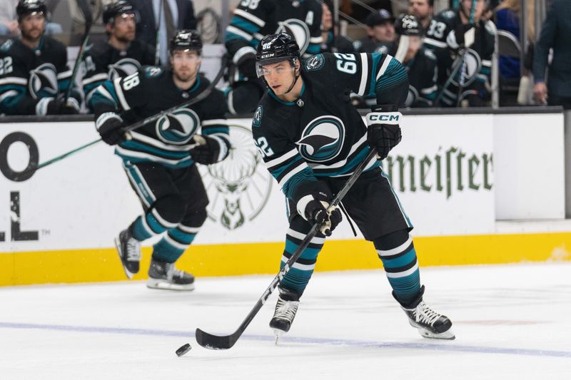 Feb 29, 2024; San Jose, California, USA;  San Jose Sharks right wing Kevin Labanc (62) controls the puck during the second period against the Anaheim Ducks at SAP Center at San Jose. Mandatory Credit: Stan Szeto-USA TODAY Sports