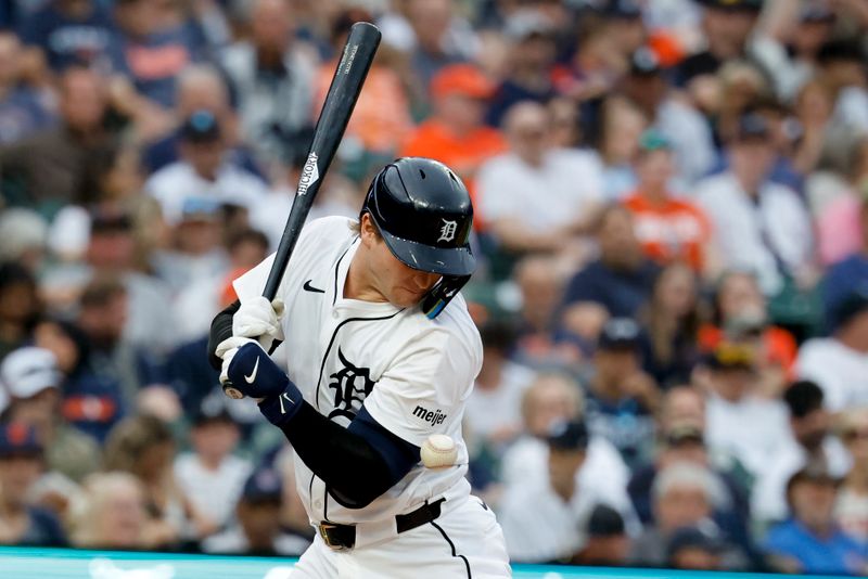 May 12, 2025; Detroit, Michigan, USA;  Detroit Tigers catcher Dillon Dingler (13) is hit by a pitch third inning against the Boston Red Sox at Comerica Park. Mandatory Credit: Rick Osentoski-Imagn Images