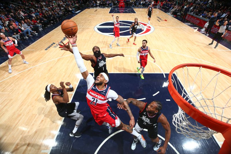 WASHINGTON, DC -? JANUARY 31:  Daniel Gafford #21 of the Washington Wizards grabs the rebound during the game  on January 31, 2024 at Capital One Arena in Washington, DC. NOTE TO USER: User expressly acknowledges and agrees that, by downloading and or using this Photograph, user is consenting to the terms and conditions of the Getty Images License Agreement. Mandatory Copyright Notice: Copyright 2024 NBAE (Photo by Stephen Gosling/NBAE via Getty Images)