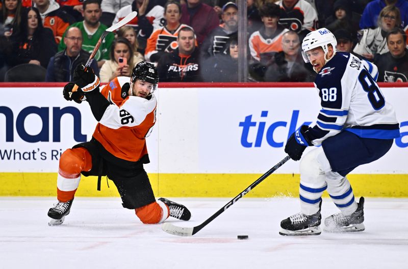 Feb 8, 2024; Philadelphia, Pennsylvania, USA; Philadelphia Flyers left wing Joel Farabee (86) loses control of the puck against Winnipeg Jets defenseman Nate Schmidt (88) in the first period at Wells Fargo Center. Mandatory Credit: Kyle Ross-USA TODAY Sports