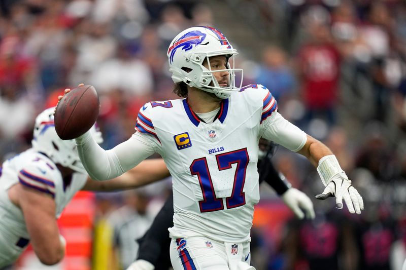 Buffalo Bills quarterback Josh Allen (17) throws a pass during the first half of an NFL football game against the Houston Texans, Sunday, Oct. 6, 2024, in Houston. (AP Photo/Eric Gay)