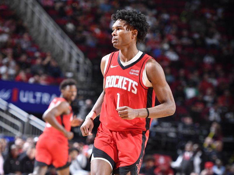 HOUSTON, TX - MARCH 25: Amen Thompson #1 of the Houston Rockets looks on during the game against the Portland Trail Blazers on March 25, 2024 at the Toyota Center in Houston, Texas. NOTE TO USER: User expressly acknowledges and agrees that, by downloading and or using this photograph, User is consenting to the terms and conditions of the Getty Images License Agreement. Mandatory Copyright Notice: Copyright 2024 NBAE (Photo by Logan Riely/NBAE via Getty Images)