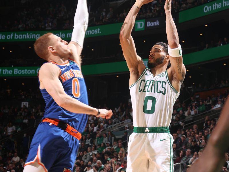 BOSTON, MA - APRIL 11: Jayson Tatum #0 of the Boston Celtics shoots a three point basket during the game against the New York Knicks on April 11, 2024 at the TD Garden in Boston, Massachusetts. NOTE TO USER: User expressly acknowledges and agrees that, by downloading and or using this photograph, User is consenting to the terms and conditions of the Getty Images License Agreement. Mandatory Copyright Notice: Copyright 2024 NBAE  (Photo by Nathaniel S. Butler/NBAE via Getty Images)