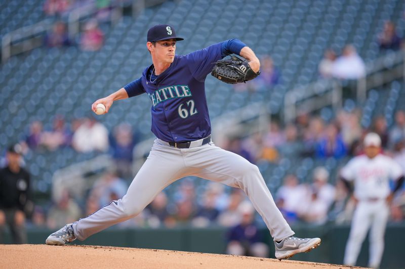 May 7, 2024; Minneapolis, Minnesota, USA; Seattle Mariners pitcher Emerson Hancock (62) pitches against the Minnesota Twins in the first inning at Target Field. Mandatory Credit: Brad Rempel-USA TODAY Sports