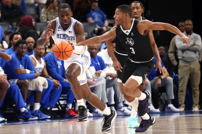 Jan 31, 2024; Memphis, Tennessee, USA; Memphis Tigers forward David Jones (8) drives the ball up the court as Rice Owls guard Travis Evee (3) attempts to steal the ball during the first half at FedExForum. Mandatory Credit: Petre Thomas-USA TODAY Sports