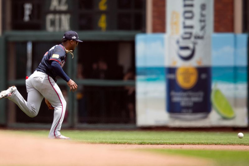 Jun 8, 2025; San Francisco, California, USA; Atlanta Braves second baseman Ozzie Albies (1) chases down a grounder by San Francisco Giants second baseman Tyler Fitzgerald during the fourth inning at Oracle Park. Fitzgerald was safe on the error. Mandatory Credit: D. Ross Cameron-Imagn Images