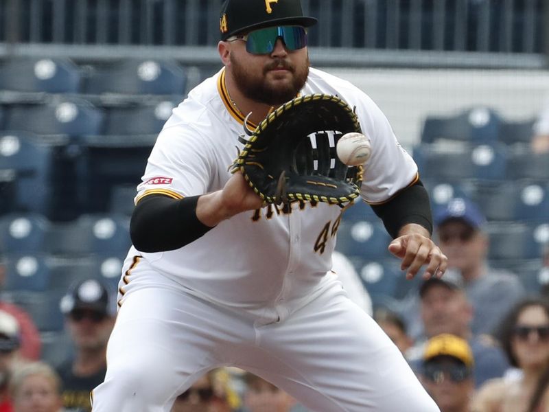 Aug 18, 2024; Pittsburgh, Pennsylvania, USA;  Pittsburgh Pirates first baseman Rowdy Tellez (44) takes a throw to retire Seattle Mariners center fielder Victor Robles (not pictured) during the first inning at PNC Park. Mandatory Credit: Charles LeClaire-USA TODAY Sports