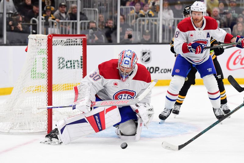 Oct 10, 2024; Boston, Massachusetts, USA;  Montreal Canadiens goaltender Cayden Primeau (30) makes a save during the first period against the Boston Bruins at TD Garden. Mandatory Credit: Bob DeChiara-Imagn Images