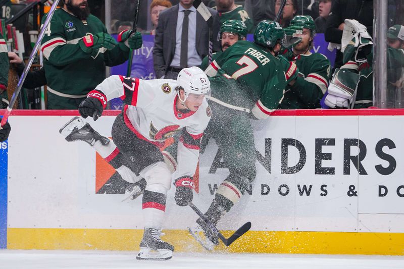 Apr 2, 2024; Saint Paul, Minnesota, USA; Ottawa Senators center Shane Pinto (57) avoids a check from Minnesota Wild defenseman Brock Faber (7)in the third period at Xcel Energy Center. Mandatory Credit: Brad Rempel-USA TODAY Sports