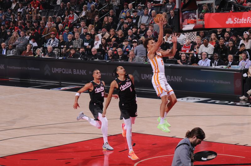 PORTLAND, OR - November 17:  Dyson Daniels #5 of the Atlanta Hawks shoots the ball during the game on November 17, 2024 at the Moda Center Arena in Portland, Oregon. NOTE TO USER: User expressly acknowledges and agrees that, by downloading and or using this photograph, user is consenting to the terms and conditions of the Getty Images License Agreement. Mandatory Copyright Notice: Copyright 2024 NBAE (Photo by Cameron Browne/NBAE via Getty Images)