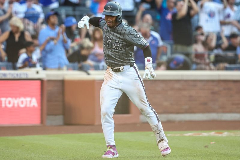 Jul 13, 2024; New York City, New York, USA; New York Mets shortstop Francisco Lindor (12) celebrates after hitting a three run home run in the eighth inning against the Colorado Rockies at Citi Field. Mandatory Credit: Wendell Cruz-USA TODAY Sports