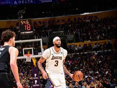 LOS ANGELES, CA - DECEMBER 2:  Anthony Davis #3 of the Los Angeles Lakers handles the ball during the game  on December 2, 2023 at Crypto.Com Arena in Los Angeles, California. NOTE TO USER: User expressly acknowledges and agrees that, by downloading and/or using this Photograph, user is consenting to the terms and conditions of the Getty Images License Agreement. Mandatory Copyright Notice: Copyright 2023 NBAE (Photo by Adam Pantozzi/NBAE via Getty Images)