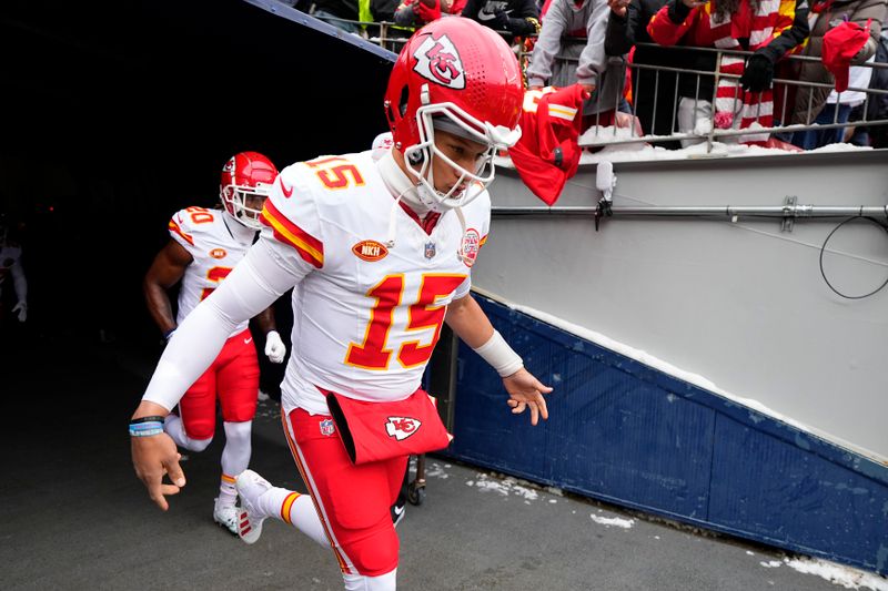 Kansas City Chiefs quarterback Patrick Mahomes jogs out to warm up before the start of an NFL football game between the Kansas City Chiefs and the Denver Broncos Sunday, Oct. 29, 2023, in Denver. (AP Photo/Jack Dempsey)