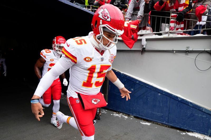 Kansas City Chiefs quarterback Patrick Mahomes jogs out to warm up before the start of an NFL football game between the Kansas City Chiefs and the Denver Broncos Sunday, Oct. 29, 2023, in Denver. (AP Photo/Jack Dempsey)