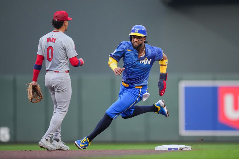 Aug 23, 2024; Minneapolis, Minnesota, USA; Minnesota Twins shortstop Willi Castro (50) rounds second base against the St. Louis Cardinals in the first inning at Target Field. Mandatory Credit: Brad Rempel-USA TODAY Sports