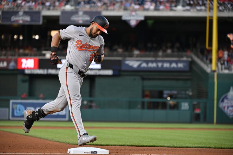 May 8, 2024; Washington, District of Columbia, USA; Baltimore Orioles outfielder Anthony Santander (25) rounds third base after hitting a home run against the Washington Nationals during the fourth inning at Nationals Park. Mandatory Credit: Rafael Suanes-USA TODAY Sports