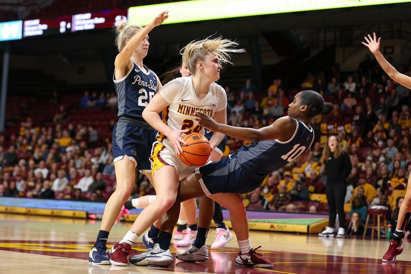 Jan 31, 2024; Minneapolis, Minnesota, USA; Minnesota Golden Gophers forward Mallory Heyer (24) fouls Penn State Nittany Lions forward Chanaya Pinto (10) during the first half at Williams Arena. Mandatory Credit: Matt Krohn-USA TODAY Sports