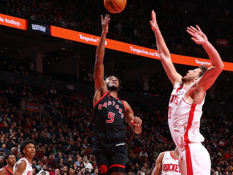 TORONTO, CANADA - FEBRUARY 9: Immanuel Quickley #5 of the Toronto Raptors drives to the basket during the game against the Houston Rockets on February 9, 2024 at the Scotiabank Arena in Toronto, Ontario, Canada.  NOTE TO USER: User expressly acknowledges and agrees that, by downloading and or using this Photograph, user is consenting to the terms and conditions of the Getty Images License Agreement.  Mandatory Copyright Notice: Copyright 2024 NBAE (Photo by Vaughn Ridley/NBAE via Getty Images)