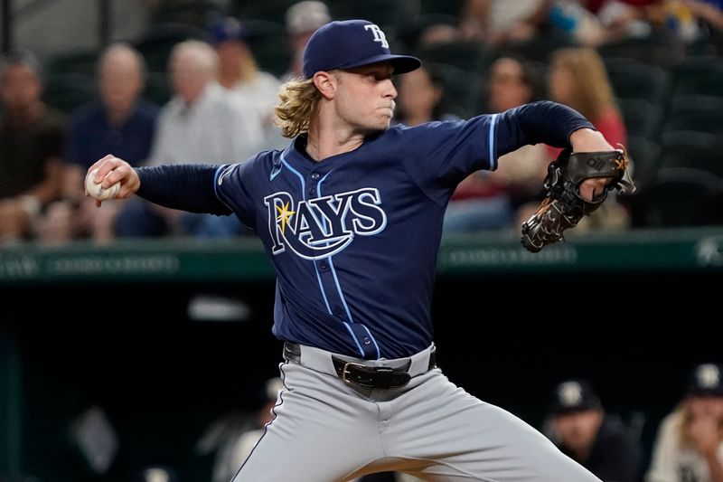 Jul 5, 2024; Arlington, Texas, USA; Tampa Bay Rays pitcher Shane Baz (11) throws to the plate during the first inning against the Tampa Bay Rays at Globe Life Field. Mandatory Credit: Raymond Carlin III-USA TODAY Sports