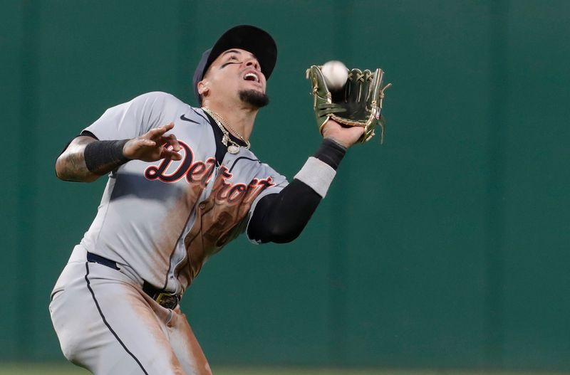 Apr 8, 2024; Pittsburgh, Pennsylvania, USA;  Detroit Tigers shortstop Javier Báez (28) makes a catch for an out against the Pittsburgh Pirates during the fourth inning at PNC Park. Mandatory Credit: Charles LeClaire-USA TODAY Sports