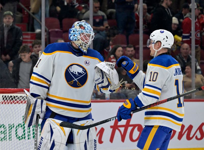 Feb 21, 2024; Montreal, Quebec, CAN; Buffalo Sabres goalie Ukko-Pekka Luukkonen (1) celebrates with teammate defenseman Henri Jokiharju (10) the win against the Montreal Canadiens at the Bell Centre. Mandatory Credit: Eric Bolte-USA TODAY Sports