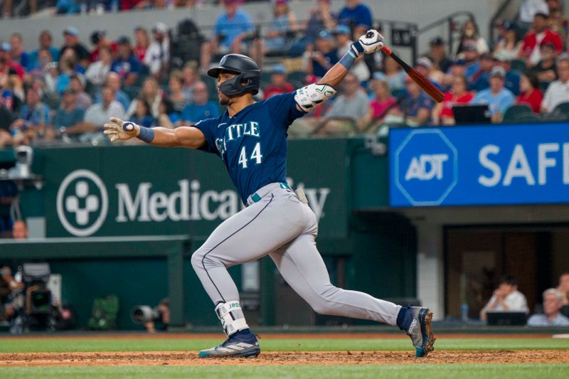 Sep 24, 2023; Arlington, Texas, USA; Seattle Mariners center fielder Julio Rodriguez (44) hits a double against the Texas Rangers during the game at Globe Life Field. Mandatory Credit: Jerome Miron-USA TODAY Sports