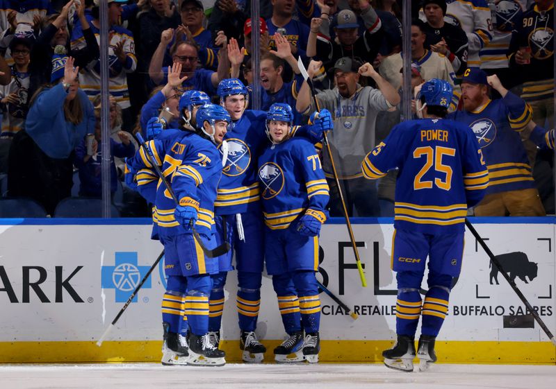 Oct 22, 2024; Buffalo, New York, USA;  Buffalo Sabres center Tage Thompson (72) celebrates his goal with teammates during the third period against the Dallas Stars at KeyBank Center. Mandatory Credit: Timothy T. Ludwig-Imagn Images