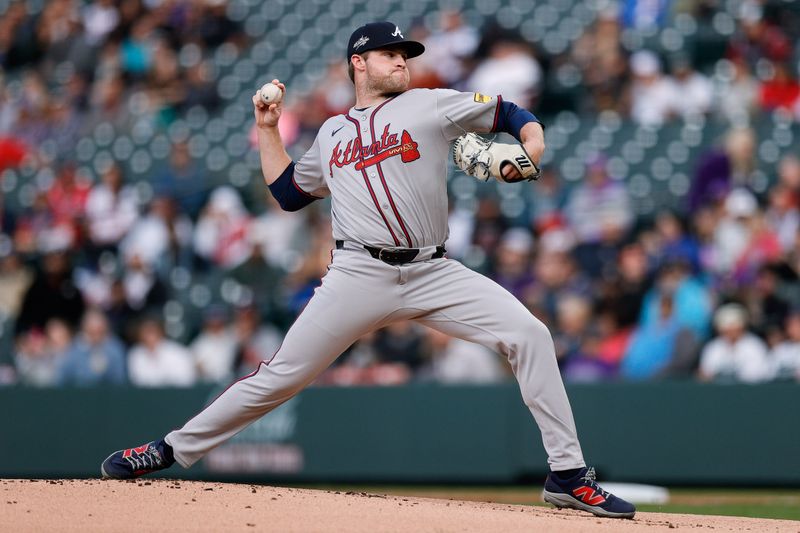 Apr 28, 2025; Denver, Colorado, USA; Atlanta Braves starting pitcher Bryce Elder (55) pitches in the first inning against the Colorado Rockies at Coors Field. Mandatory Credit: Isaiah J. Downing-Imagn Images