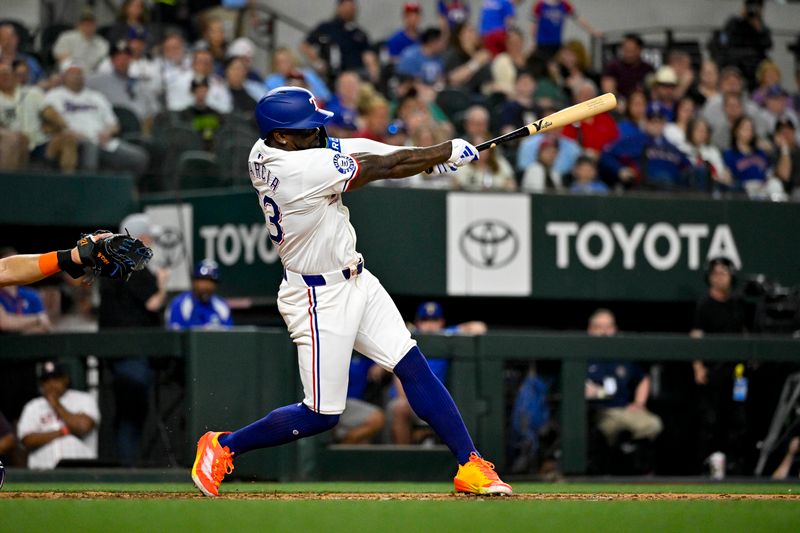 Apr 5, 2024; Arlington, Texas, USA; Texas Rangers right fielder Adolis Garcia (53) hits a single and drives in a run against the Houston Astros during the fifth inning at Globe Life Field. Mandatory Credit: Jerome Miron-USA TODAY Sports