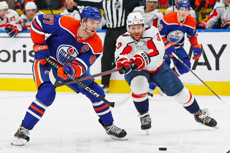 Mar 13, 2024; Edmonton, Alberta, CAN; Edmonton Oilers forward Connor McDavid (97) ties to move the puck past Washington Capitals defensemen Nick Jensen (3) during the first period at Rogers Place. Mandatory Credit: Perry Nelson-USA TODAY Sports