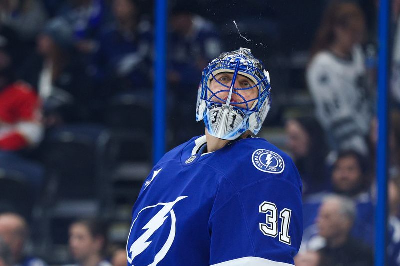 Dec 15, 2025; Tampa, Florida, USA; Tampa Bay Lightning goaltender Jonas Johansson (31) looks on against the Florida Panthers in the second period at Benchmark International Arena. Mandatory Credit: Nathan Ray Seebeck-Imagn Images