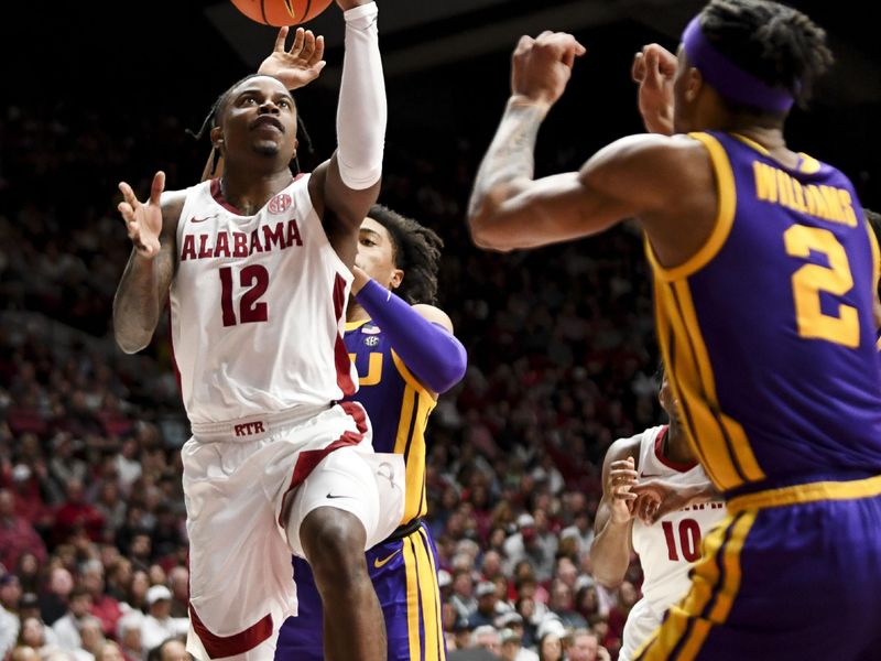 Jan 27, 2024; Tuscaloosa, Alabama, USA;  Alabama guard Latrell Wrightsell Jr. (12) goes to the basket against LSU guard Mike Williams III (2) at Coleman Coliseum. Mandatory Credit: Gary Cosby Jr.-USA TODAY Sports