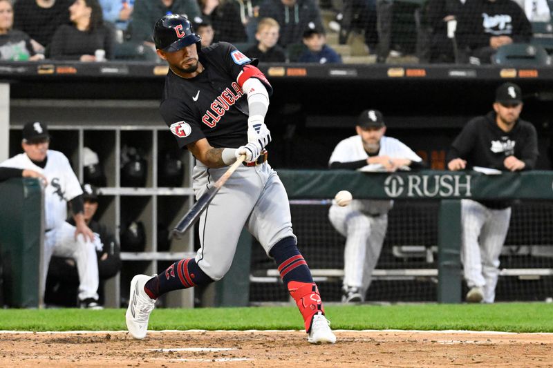 May 10, 2024; Chicago, Illinois, USA;  Cleveland Guardians third base Gabriel Arias (13) singles against the Chicago White Sox during the fifth inning at Guaranteed Rate Field. Mandatory Credit: Matt Marton-USA TODAY Sports