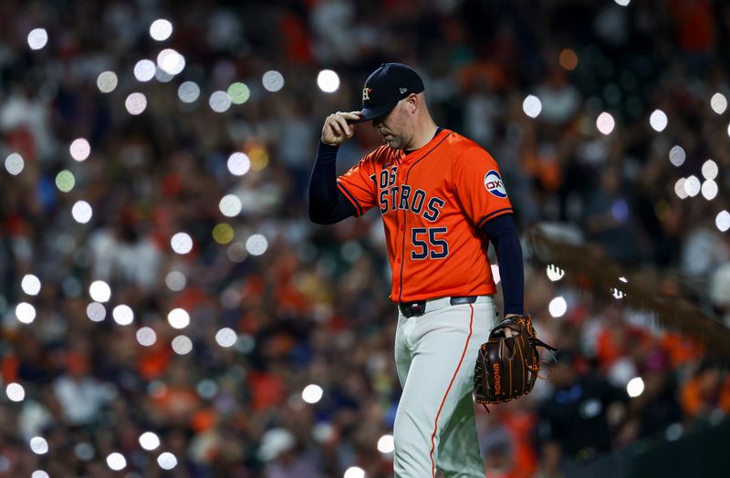 Sep 20, 2024; Houston, Texas, USA; Houston Astros relief pitcher Ryan Pressly (55) walks to the mound during the eighth inning against the Los Angeles Angels at Minute Maid Park. Mandatory Credit: Troy Taormina-Imagn Images