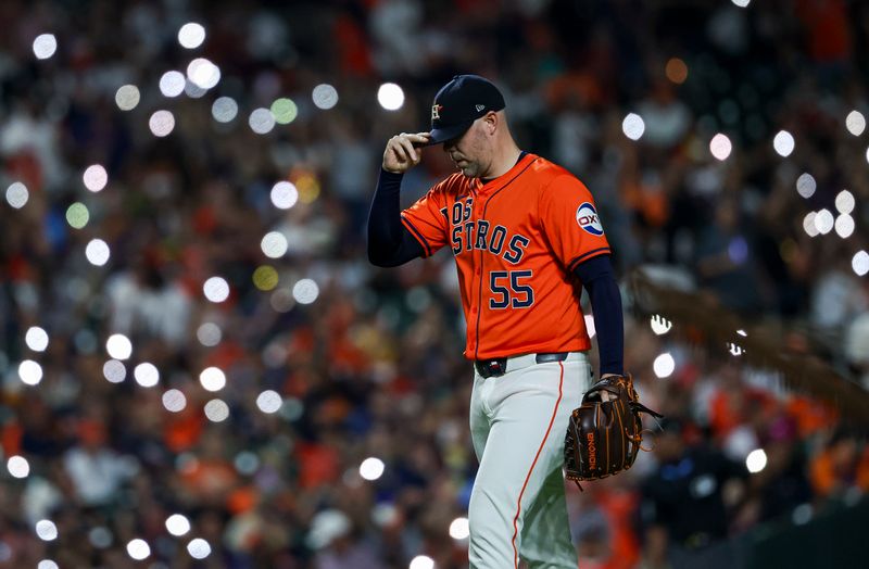 Sep 20, 2024; Houston, Texas, USA; Houston Astros relief pitcher Ryan Pressly (55) walks to the mound during the eighth inning against the Los Angeles Angels at Minute Maid Park. Mandatory Credit: Troy Taormina-Imagn Images