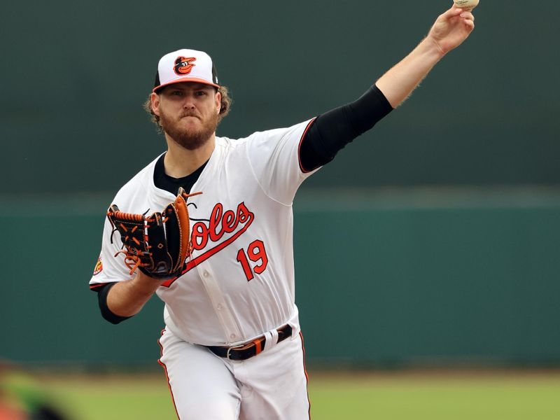 Mar 2, 2024; Sarasota, Florida, USA; Baltimore Orioles starting pitcher Cole Irvin (19) throws a pitch during the first inning against the New York Yankees at Ed Smith Stadium. Mandatory Credit: Kim Klement Neitzel-USA TODAY Sports