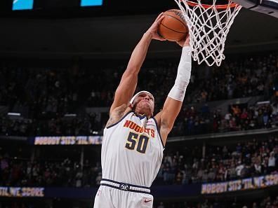 DENVER, CO - DECEMBER 25: Aaron Gordon #50 of the Denver Nuggets dunks the ball during the game against the Golden State Warriors on December 25, 2023 at the Ball Arena in Denver, Colorado. NOTE TO USER: User expressly acknowledges and agrees that, by downloading and/or using this Photograph, user is consenting to the terms and conditions of the Getty Images License Agreement. Mandatory Copyright Notice: Copyright 2023 NBAE (Photo by Bart Young/NBAE via Getty Images)