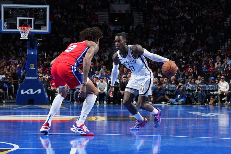 PHILADELPHIA, PA - NOVEMBER 22: Dennis Schroder #17 of the Brooklyn Nets drives to the basket during the game against the Philadelphia 76ers during the Emirates NBA Cup game on November 22, 2024 at the Wells Fargo Center in Philadelphia, Pennsylvania NOTE TO USER: User expressly acknowledges and agrees that, by downloading and/or using this Photograph, user is consenting to the terms and conditions of the Getty Images License Agreement. Mandatory Copyright Notice: Copyright 2024 NBAE (Photo by Jesse D. Garrabrant/NBAE via Getty Images)