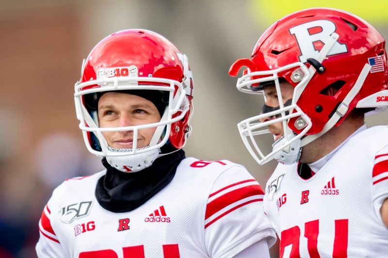 Nov 2, 2019; Champaign, IL, USA; Rutgers Scarlet Knights punter Adam Korsak (left) looks on prior to a game against the Illinois Fighting Illini at Memorial Stadium. Mandatory Credit: Patrick Gorski-USA TODAY Sports