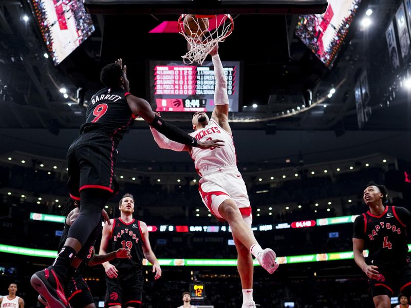 TORONTO, ON - FEBRUARY 9: Dillon Brooks #9 of the Houston Rockets goes to the basket against RJ Barrett #9 of the Toronto Raptors during the first half of their basketball game at the Scotiabank Arena on February 9, 2024 in Toronto, Ontario, Canada. NOTE TO USER: User expressly acknowledges and agrees that, by downloading and/or using this Photograph, user is consenting to the terms and conditions of the Getty Images License Agreement. (Photo by Mark Blinch/Getty Images)