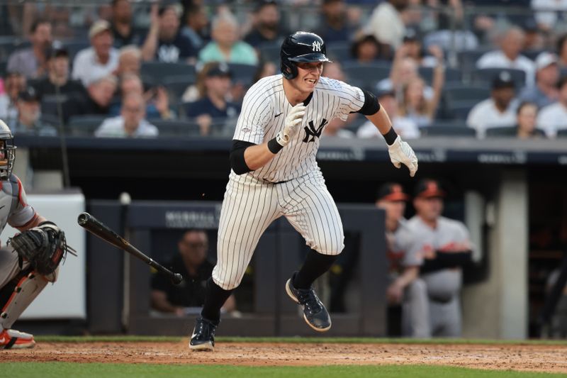 Jun 18, 2024; Bronx, New York, USA; New York Yankees first baseman Ben Rice (93) singles during the third inning against the Baltimore Orioles at Yankee Stadium. Mandatory Credit: Vincent Carchietta-USA TODAY Sports