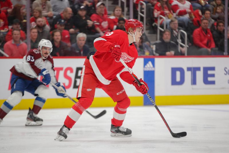 Mar 18, 2023; Detroit, Michigan, USA; Detroit Red Wings defenseman Simon Edvinsson (3) handles the puck during the first period at Little Caesars Arena. Mandatory Credit: Brian Bradshaw Sevald-USA TODAY Sports