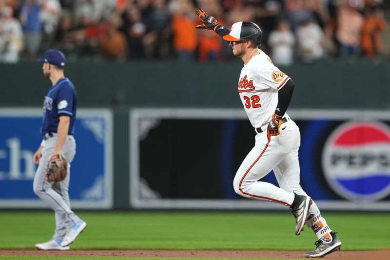 Sep 14, 2023; Baltimore, Maryland, USA; Baltimore Orioles first baseman Ryan O   Hearn (32) rounds the bases following his solo home run in the first inning against the Tampa Bay Rays at Oriole Park at Camden Yards. Mandatory Credit: Mitch Stringer-USA TODAY Sports