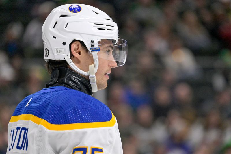 Feb 17, 2024; Saint Paul, Minnesota, USA;  Buffalo Sabres defenseman Connor Clifton (75) looks on against the Minnesota Wild during the second period at Xcel Energy Center. Mandatory Credit: Nick Wosika-USA TODAY Sports