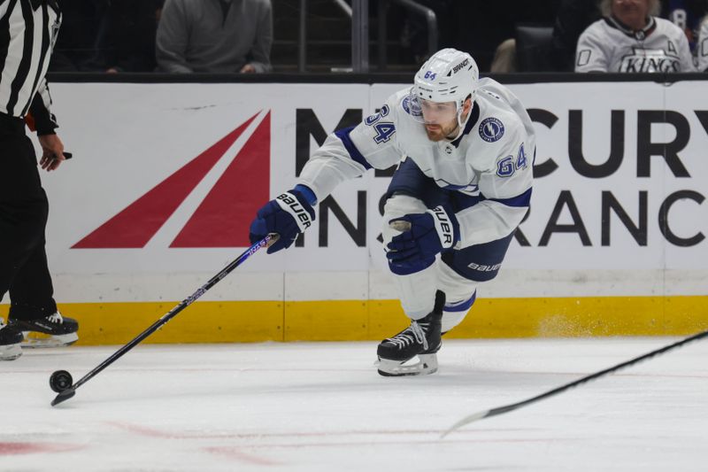 Mar 23, 2024; Los Angeles, California, USA; Tampa Bay Lighting center Tyler Motte (64) moves the puck during the third period against the Los Angeles Kings at Crypto.com Arena. Mandatory Credit: Yannick Peterhans-USA TODAY Sports