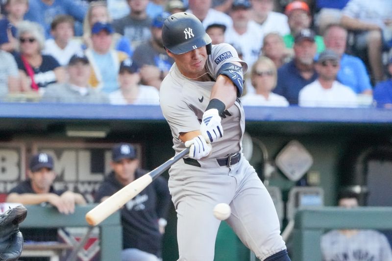 Jun 10, 2024; Kansas City, Missouri, USA; New York Yankees shortstop Anthony Volpe (11) at bat against the Kansas City Royals in the first inning at Kauffman Stadium. Mandatory Credit: Denny Medley-USA TODAY Sports